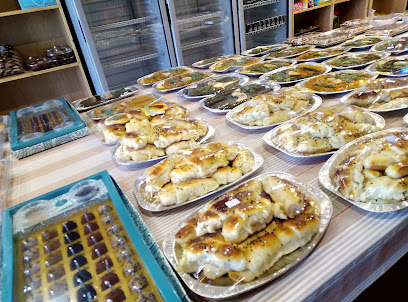 عوظه للحلويات - تبوك - +966 56 762 0677