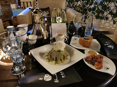 نصف قهوة كافيه للعائلات Nos Cafe - خميس مشيط -